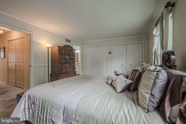 3305 Keswick Way Unit 3305D, West Chester, PA 19382 - carpeted bedroom with two closets and ornamental molding