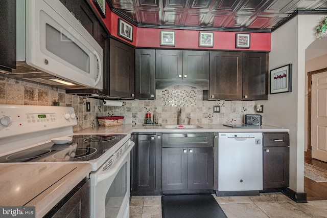 3305 Keswick Way Unit 3305D, West Chester, PA 19382 - kitchen featuring white appliances, decorative backsplash, light countertops, and an ornate ceiling