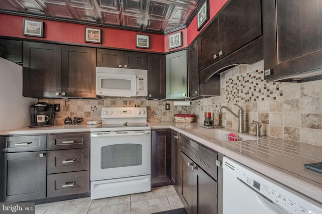 3305 Keswick Way Unit 3305D, West Chester, PA 19382 - kitchen with white appliances, tasteful backsplash, light countertops, an ornate ceiling, and dark brown cabinets
