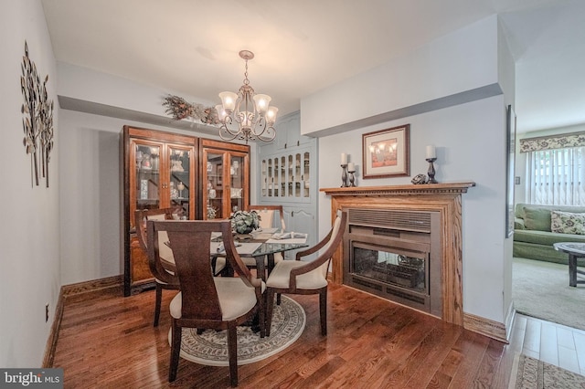 3305 Keswick Way Unit 3305D, West Chester, PA 19382 - dining room featuring a chandelier, wood finished floors, and a fireplace
