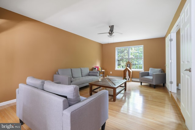 2299 Long Acre Dr, Effort, PA 18330 - living area featuring a ceiling fan, baseboard heating, and light wood-style floors