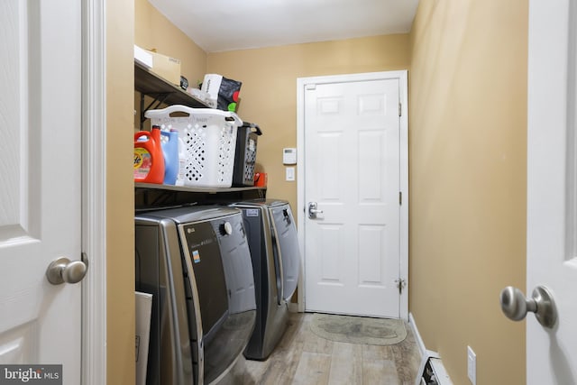 2299 Long Acre Dr, Effort, PA 18330 - laundry room featuring independent washer and dryer and light wood-style flooring