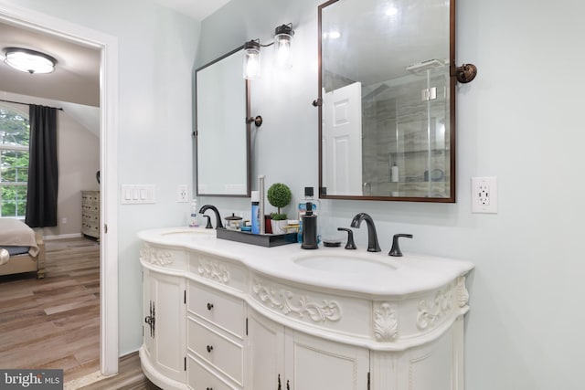 2299 Long Acre Dr, Effort, PA 18330 - ensuite bathroom featuring double vanity, wood finished floors, and a stall shower