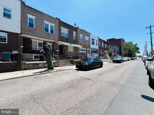 1609 S 28th St, Philadelphia, PA 19145 - view of asphalt street featuring sidewalks, curbs, a residential view, and street lights