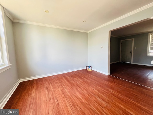 1609 S 28th St, Philadelphia, PA 19145 - spare room featuring wood finished floors and crown molding