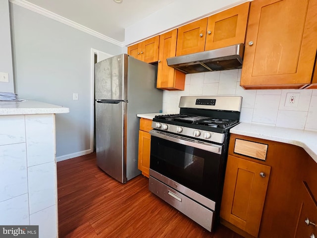 1609 S 28th St, Philadelphia, PA 19145 - kitchen with appliances with stainless steel finishes, under cabinet range hood, wood finished floors, crown molding, and brown cabinets