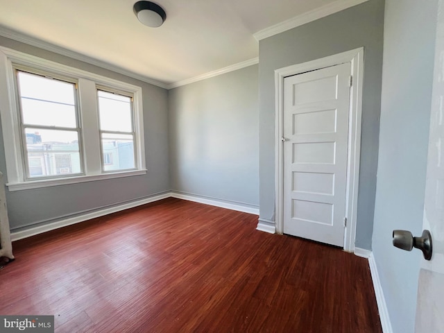 1609 S 28th St, Philadelphia, PA 19145 - unfurnished room featuring dark wood-style floors and crown molding