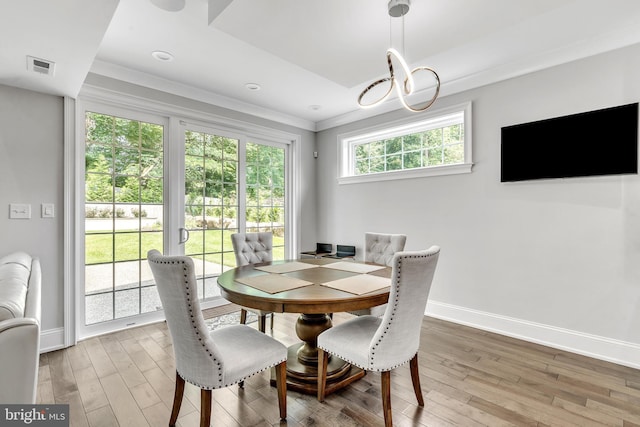 1631 E Strasburg Rd, West Chester, PA 19380 - dining room with light wood-style floors, ornamental molding, and a chandelier