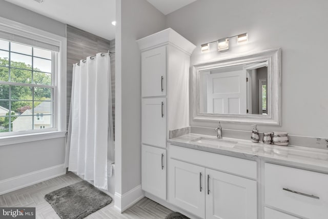 1631 E Strasburg Rd, West Chester, PA 19380 - full bathroom with vanity, healthy amount of natural light, and shower / bath combo with shower curtain