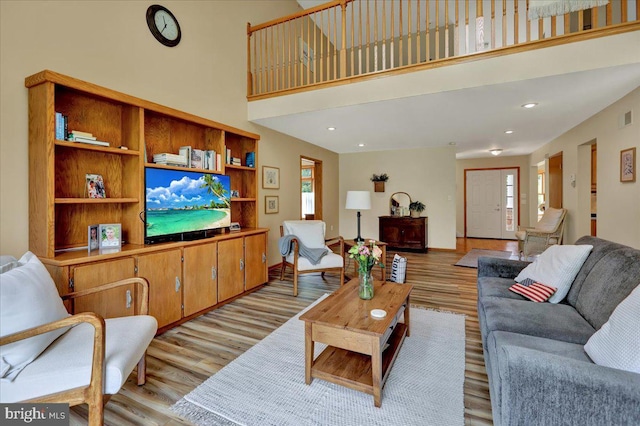 96 Gunhart Rd, Mohnton, PA 19540 - living area featuring light wood-style flooring, a towering ceiling, and recessed lighting