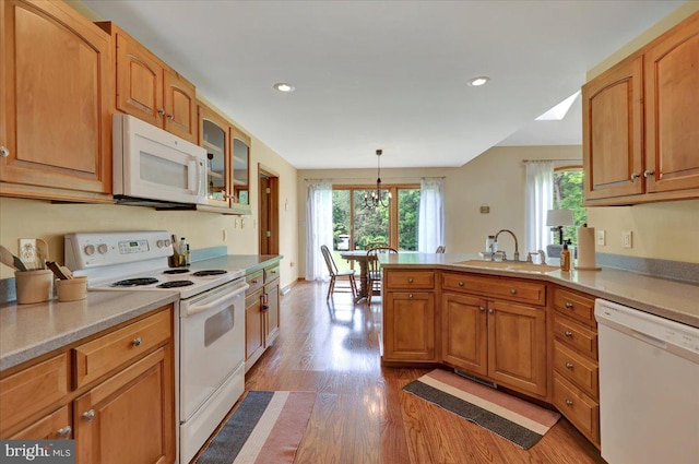 96 Gunhart Rd, Mohnton, PA 19540 - kitchen with white appliances, light wood-style flooring, a peninsula, glass insert cabinets, and recessed lighting