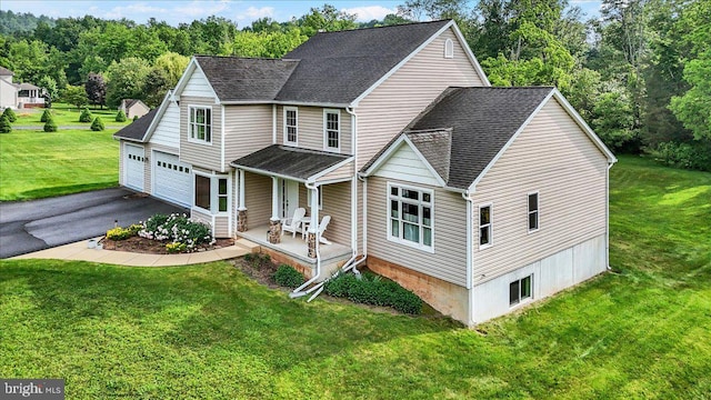 96 Gunhart Rd, Mohnton, PA 19540 - view of front of house with covered porch, driveway, a front yard, and a shingled roof