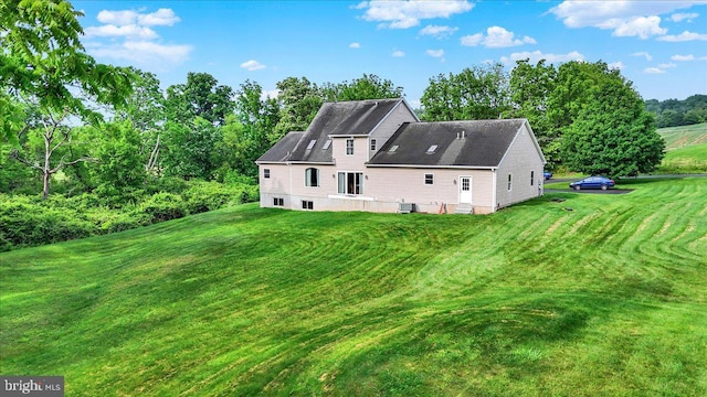 96 Gunhart Rd, Mohnton, PA 19540 - back of house with a lawn and view of wooded area