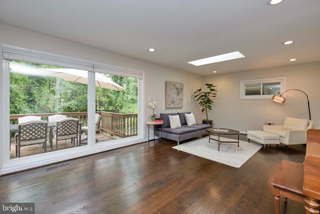 2301 N Tracy St, Alexandria, VA 22311 - living area with a skylight, recessed lighting, and wood finished floors