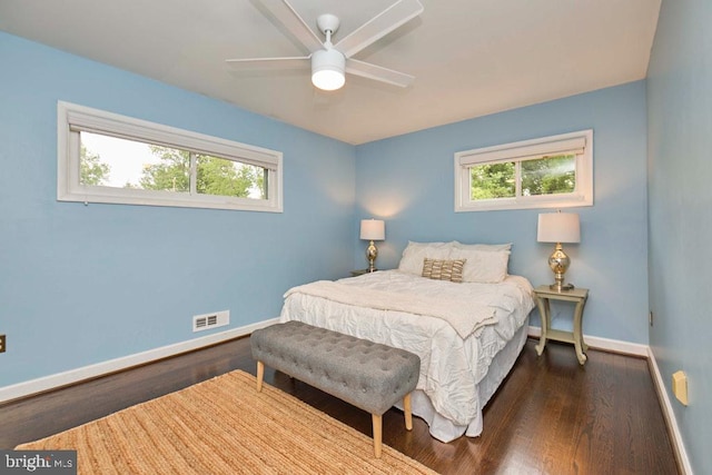 2301 N Tracy St, Alexandria, VA 22311 - bedroom featuring multiple windows, wood finished floors, and a ceiling fan