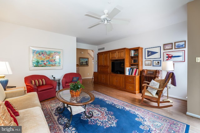 247 Torrey Pine Ct, West Chester, PA 19380 - living room with light wood-style flooring and ceiling fan