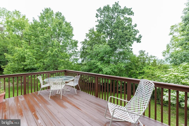 247 Torrey Pine Ct, West Chester, PA 19380 - deck featuring outdoor dining area and view of wooded area