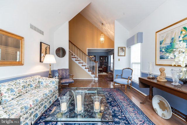 247 Torrey Pine Ct, West Chester, PA 19380 - living room featuring stairs, wood finished floors, and high vaulted ceiling
