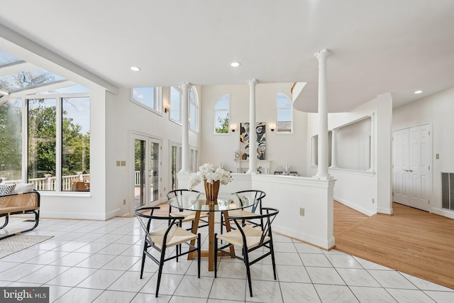 9309 Bells Mill Rd, Potomac, MD 20854 - dining room featuring recessed lighting, french doors, and ornate columns