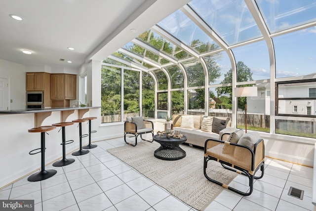 9309 Bells Mill Rd, Potomac, MD 20854 - sunroom / solarium with an outdoor living space