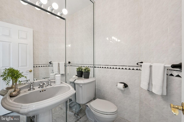9309 Bells Mill Rd, Potomac, MD 20854 - bathroom with tile walls and toilet