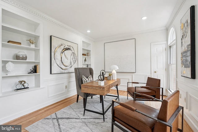 9309 Bells Mill Rd, Potomac, MD 20854 - office space with light wood-style flooring, built in shelves, a decorative wall, crown molding, and recessed lighting