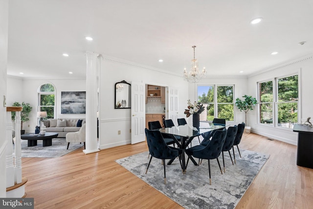 9309 Bells Mill Rd, Potomac, MD 20854 - dining room featuring recessed lighting, ornamental molding, a chandelier, and light wood finished floors