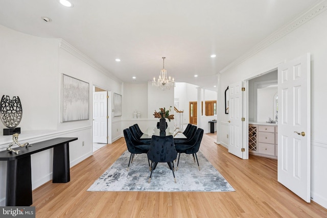 9309 Bells Mill Rd, Potomac, MD 20854 - dining room with a chandelier, light wood finished floors, recessed lighting, and ornamental molding