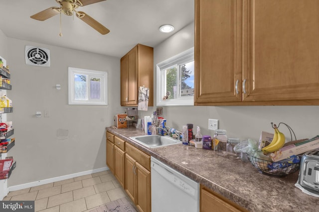 2306 Louise Ave, Baltimore, MD 21214 - kitchen with dishwasher, plenty of natural light, a ceiling fan, and brown cabinetry