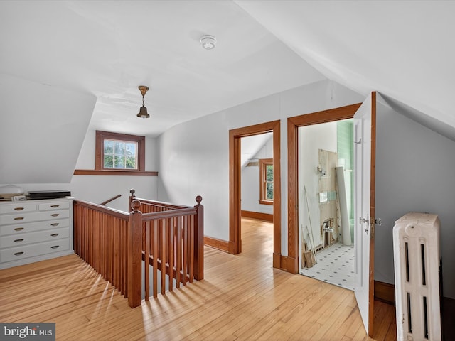 1070 Wheatland Ave, Lancaster, PA 17603 - bonus room with vaulted ceiling, radiator heating unit, and hardwood / wood-style floors