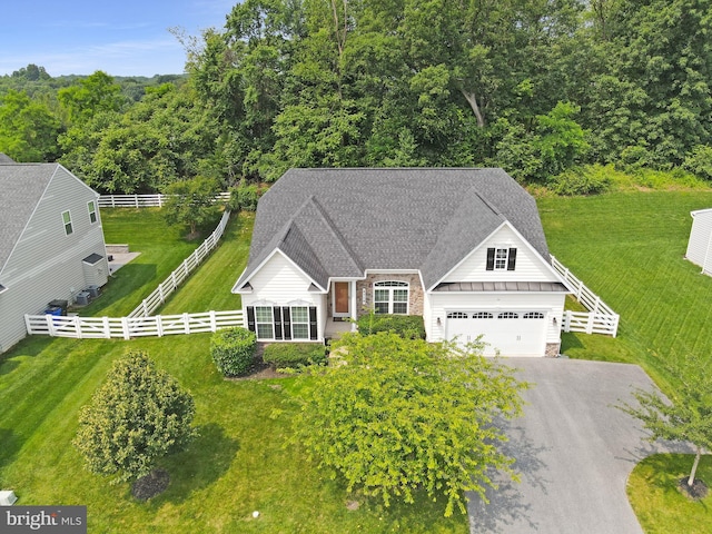 4714 De Invierno, Mount Airy, MD 21771 - view of front facade with a standing seam roof, an attached garage, asphalt driveway, a metal roof, and a shingled roof