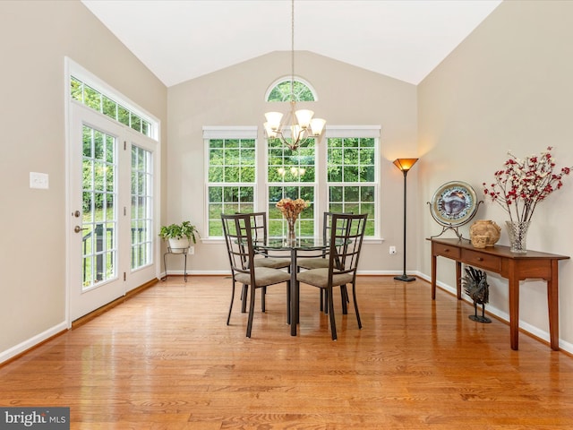 4714 De Invierno, Mount Airy, MD 21771 - dining room featuring a chandelier, light wood-style floors, and vaulted ceiling
