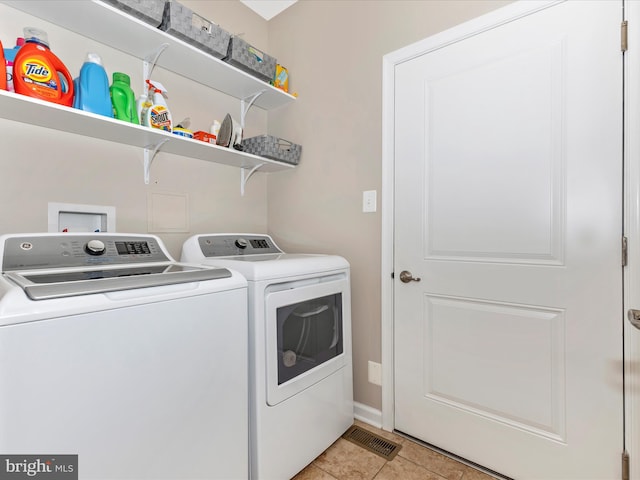 4714 De Invierno, Mount Airy, MD 21771 - laundry room with washing machine and clothes dryer and light tile patterned floors