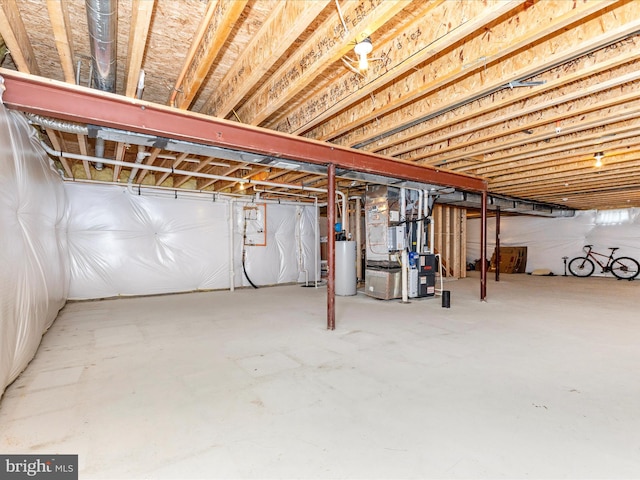 4714 De Invierno, Mount Airy, MD 21771 - unfinished below grade area featuring drainage system and gas water heater