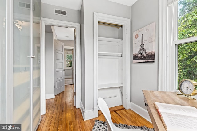 3010 26th St NE, Washington, DC 20018 - hallway featuring light wood finished floors and baseboards