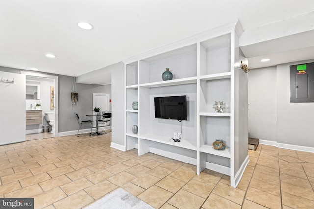 3010 26th St NE, Washington, DC 20018 - unfurnished living room featuring electric panel, built in features, recessed lighting, and light tile patterned flooring