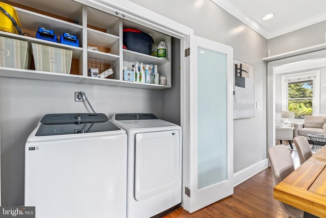 3010 26th St NE, Washington, DC 20018 - laundry room with independent washer and dryer, crown molding, wood finished floors, and recessed lighting
