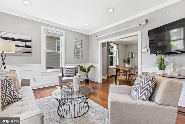 3010 26th St NE, Washington, DC 20018 - living area featuring recessed lighting, wood finished floors, wainscoting, and ornamental molding