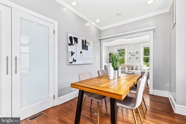 3010 26th St NE, Washington, DC 20018 - dining space featuring dark wood-type flooring, recessed lighting, and ornamental molding