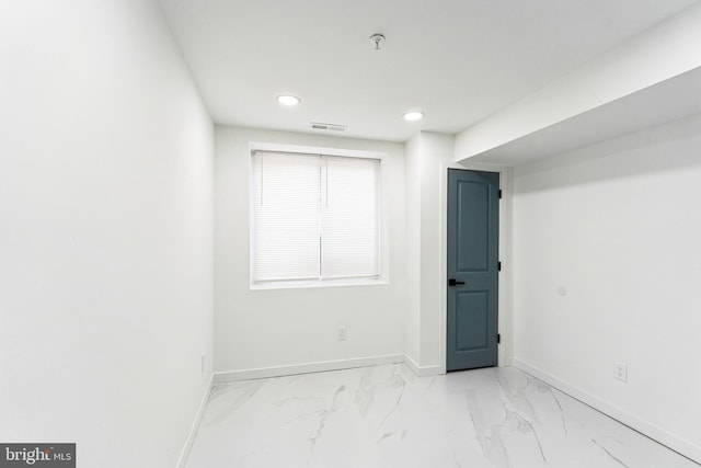 5937 Osage Ave Unit B, Philadelphia, PA 19143 - spare room featuring fire sprinkler in ceiling, baseboards, marble look tile flooring, and recessed lighting
