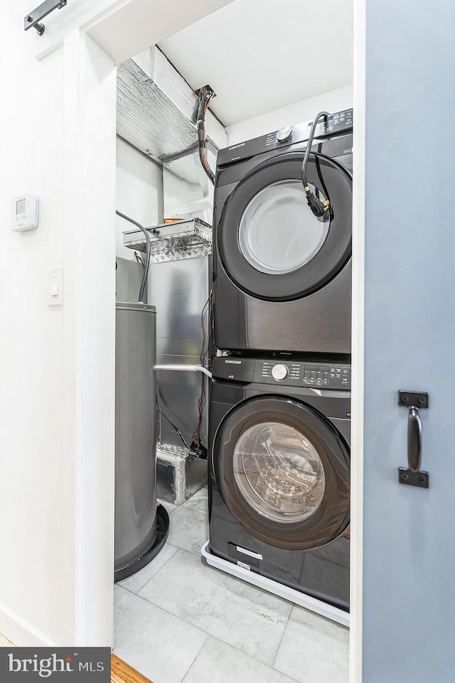 5937 Osage Ave Unit B, Philadelphia, PA 19143 - laundry area with stacked washer and clothes dryer