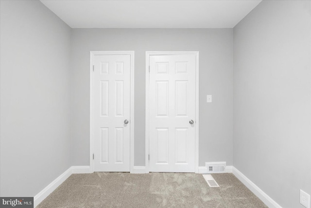 8119 Clyde Bank Rd, Towson, MD 21286 - unfurnished bedroom featuring carpet flooring and baseboards
