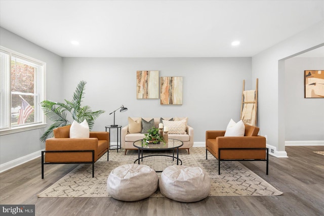 8119 Clyde Bank Rd, Towson, MD 21286 - living area featuring wood finished floors and recessed lighting