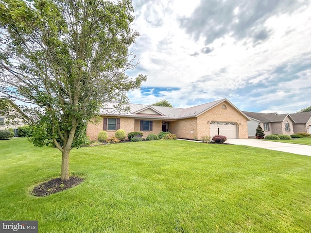 60 Parkwood Dr, Greencastle, PA 17225 - single story home featuring an attached garage, concrete driveway, a front yard, and metal roof