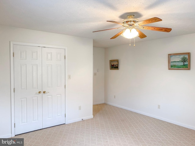 60 Parkwood Dr, Greencastle, PA 17225 - unfurnished bedroom featuring a closet, light carpet, baseboards, and ceiling fan