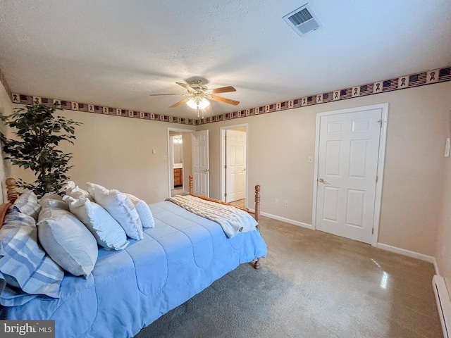 60 Parkwood Dr, Greencastle, PA 17225 - bedroom with carpet flooring, baseboards, a ceiling fan, and a baseboard radiator