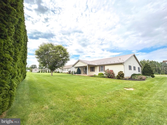 60 Parkwood Dr, Greencastle, PA 17225 - view of front facade featuring a front yard and metal roof
