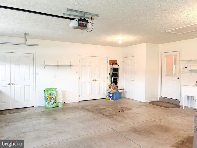 60 Parkwood Dr, Greencastle, PA 17225 - garage with a garage door opener and baseboards