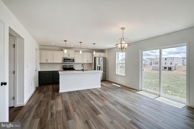 606 Montgomery Ave Lot 45, Pennsburg, PA 18073 - kitchen featuring appliances with stainless steel finishes, dark wood-style floors, a chandelier, light countertops, and recessed lighting