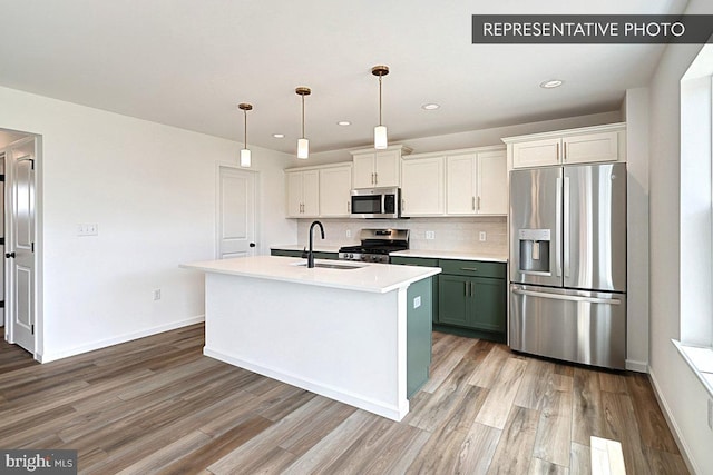 606 Montgomery Ave Lot 45, Pennsburg, PA 18073 - kitchen featuring stainless steel appliances, light wood-type flooring, light countertops, recessed lighting, and white cabinetry